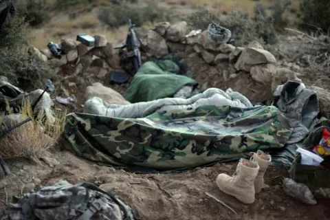 Soldiers sleep during Paktika mission