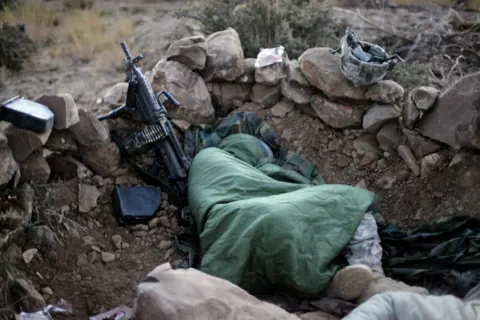 Soldiers sleep during Paktika mission