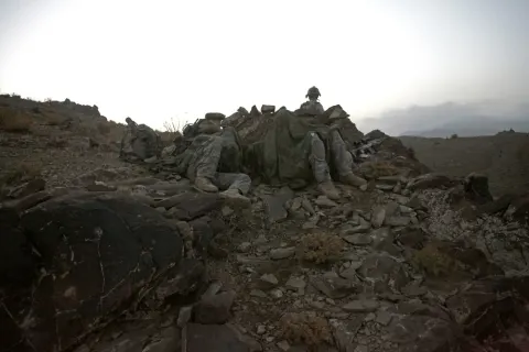Soldiers rest overnight after patroling Paktika province