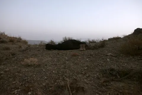 Soldiers rest overnight after patroling Paktika province