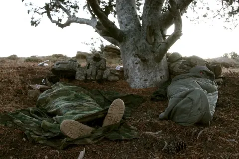 Soldiers rest overnight after patroling Paktika province
