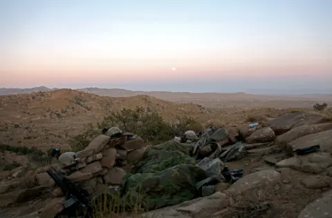 Soldiers rest overnight after patroling Paktika province