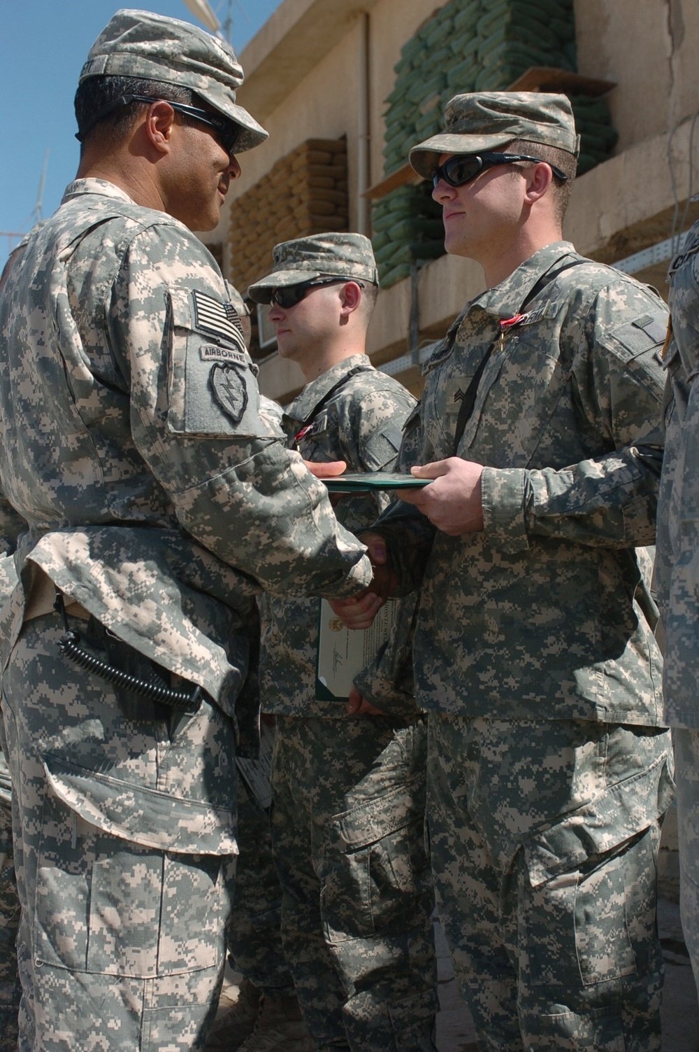 A 1-40 CAV Soldier receives a valor award during a 2007 ceremony in Iraq